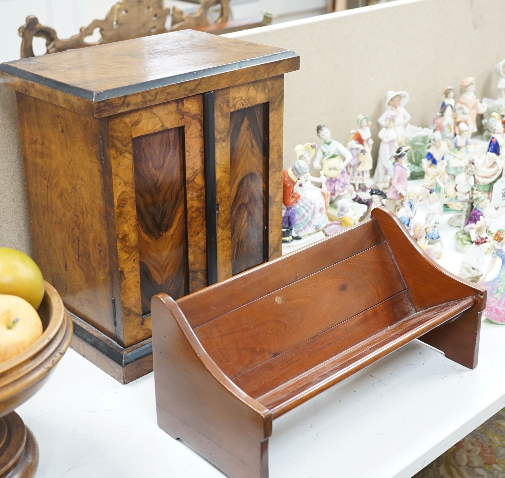 A Victorian walnut collector’s cabinet of drawers and adjustable book trough made out of ‘mahogany from the popular pleasure steamer “La Marguerite” dismantled 1926’